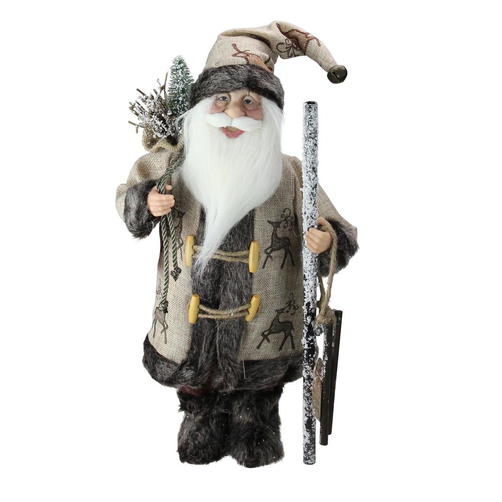 16.5" Country Rustic Santa Claus Carrying a Wooden Sled and Sack of Gifts. Picture 1
