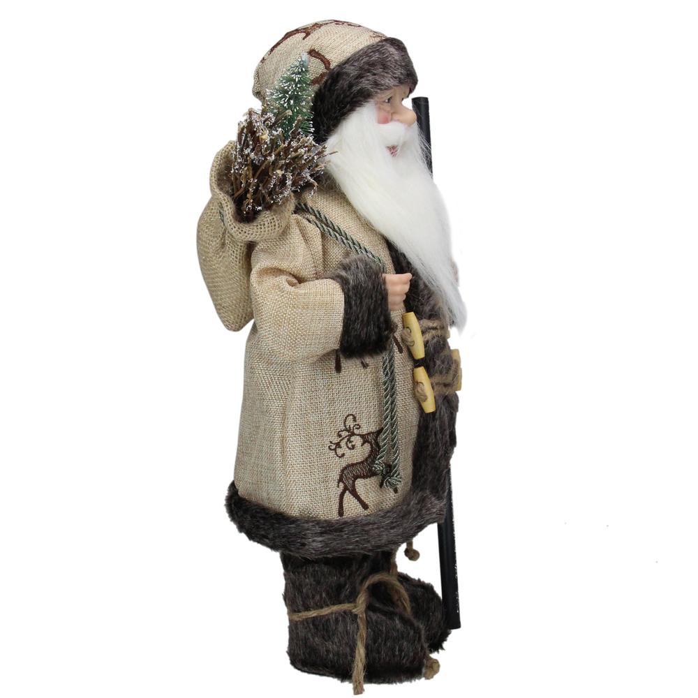 16.5" Country Rustic Santa Claus Carrying a Wooden Sled and Sack of Gifts. Picture 4