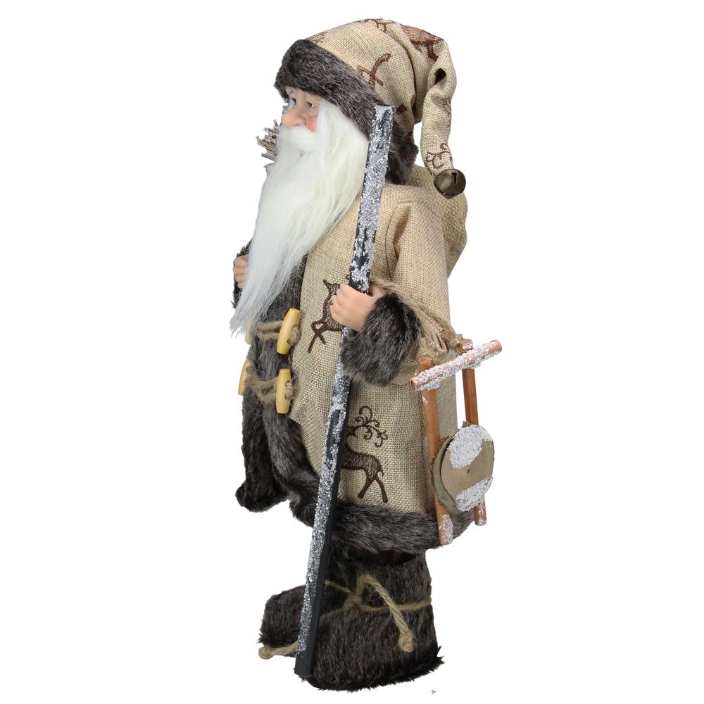 16.5" Country Rustic Santa Claus Carrying a Wooden Sled and Sack of Gifts. Picture 2
