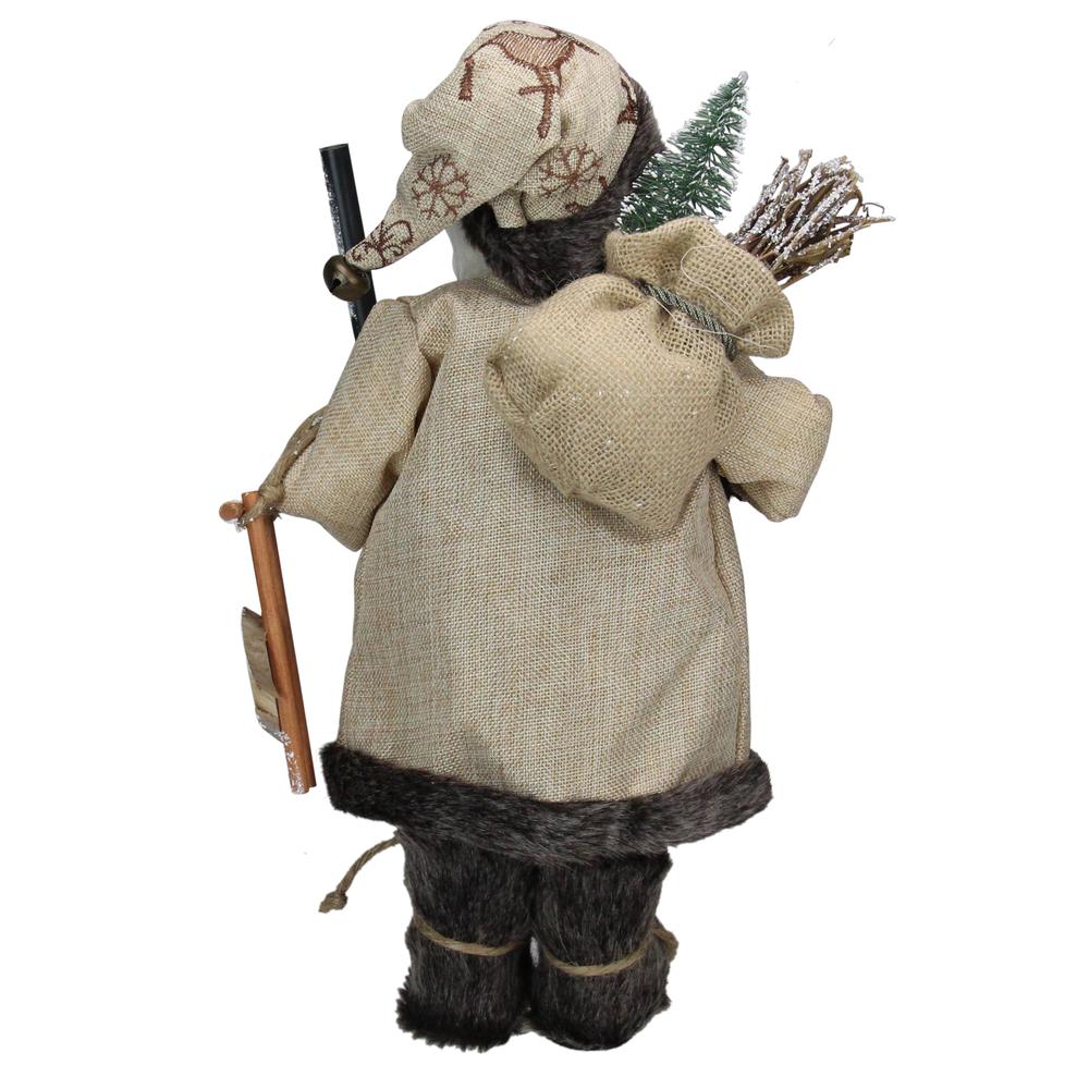 16.5" Country Rustic Santa Claus Carrying a Wooden Sled and Sack of Gifts. Picture 3