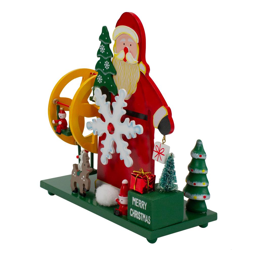 9.5" Red and Green Santa Claus Wonderland Christmas Musical Tabletop Decor. Picture 3