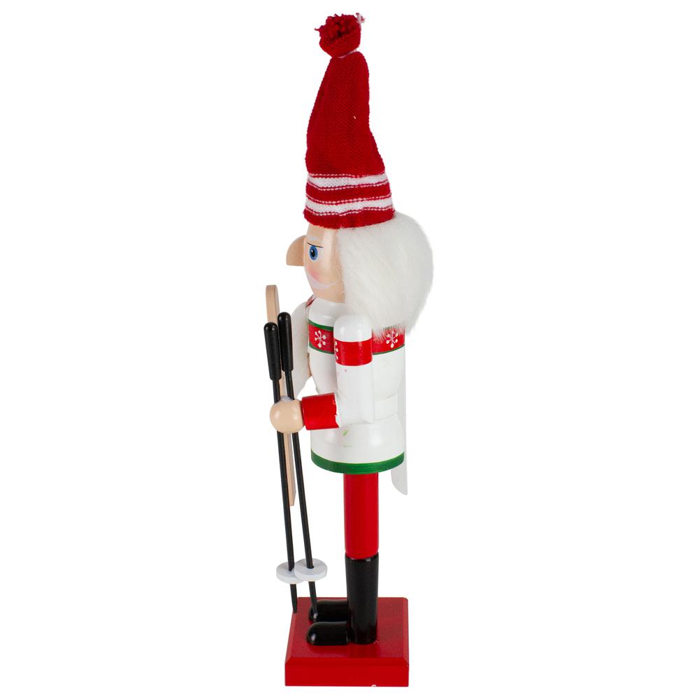 14" Red and White Wooden Skiing Christmas Nutcracker. Picture 3