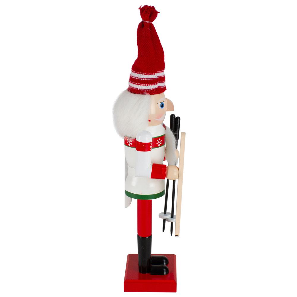 14" Red and White Wooden Skiing Christmas Nutcracker. Picture 4