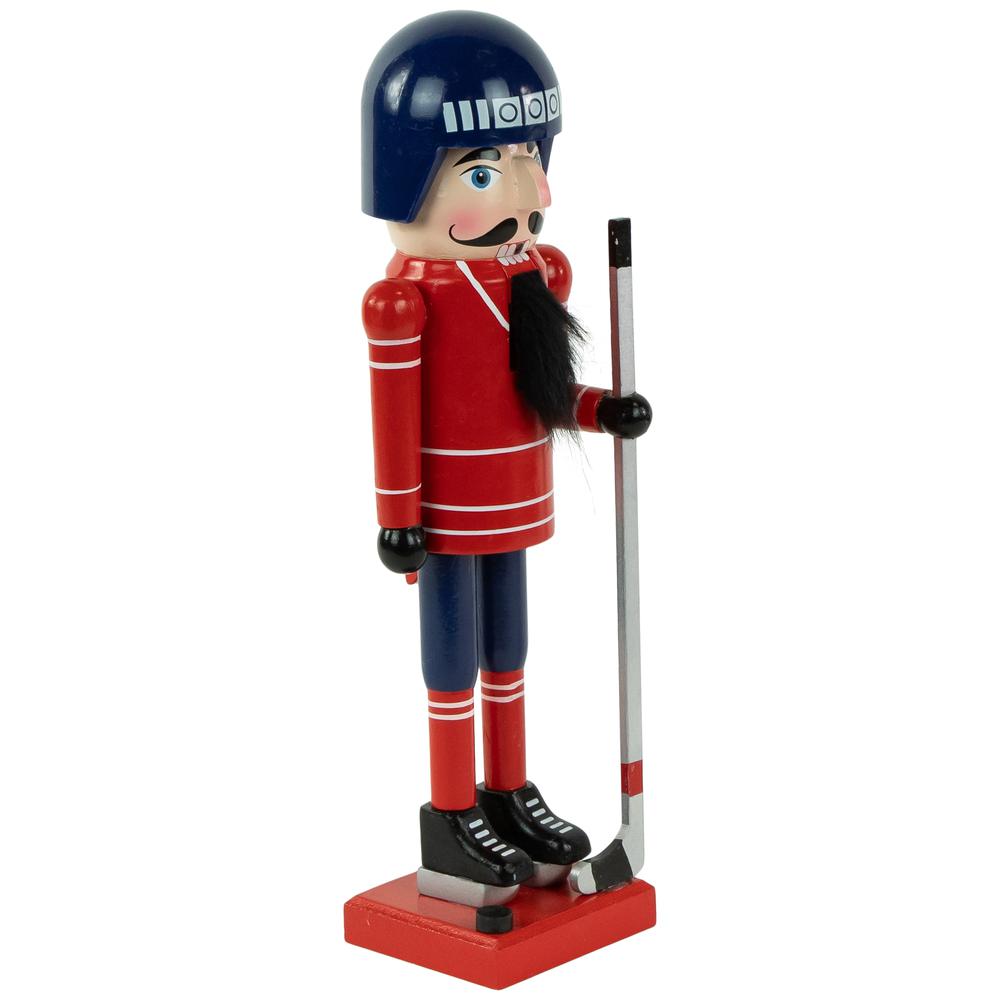 14" Blue and Red Wooden Christmas Ice Hockey Player Nutcracker. Picture 3