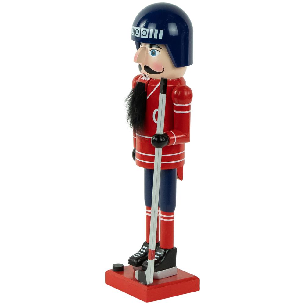 14" Blue and Red Wooden Christmas Ice Hockey Player Nutcracker. Picture 4