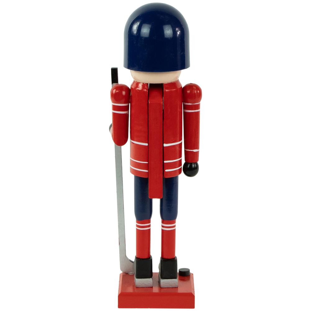 14" Blue and Red Wooden Christmas Ice Hockey Player Nutcracker. Picture 5