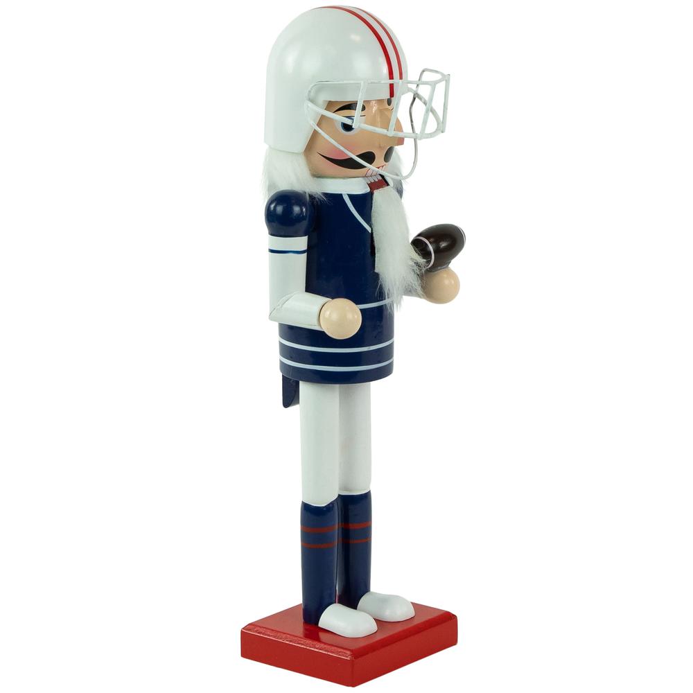 14" Red and White Wooden Christmas Nutcracker Football Player. Picture 3