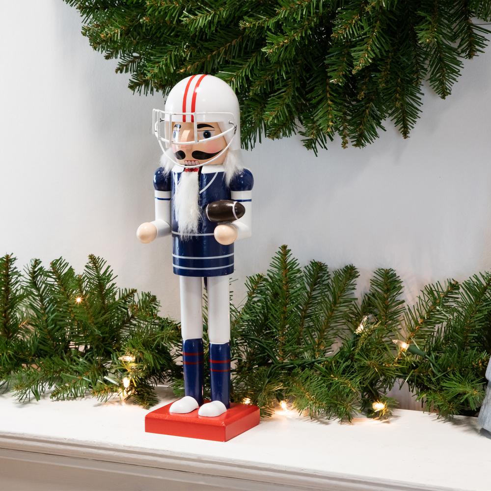 14" Red and White Wooden Christmas Nutcracker Football Player. Picture 2