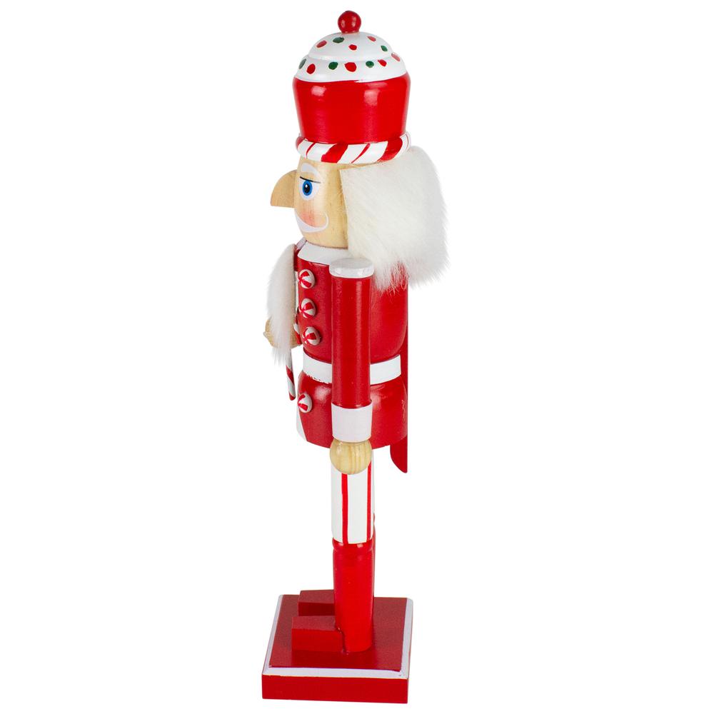 14" Red and White Wooden Candy Cane King Christmas Nutcracker. Picture 3
