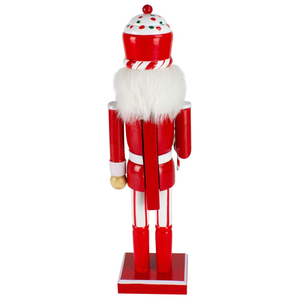 14" Red and White Wooden Candy Cane King Christmas Nutcracker. Picture 5