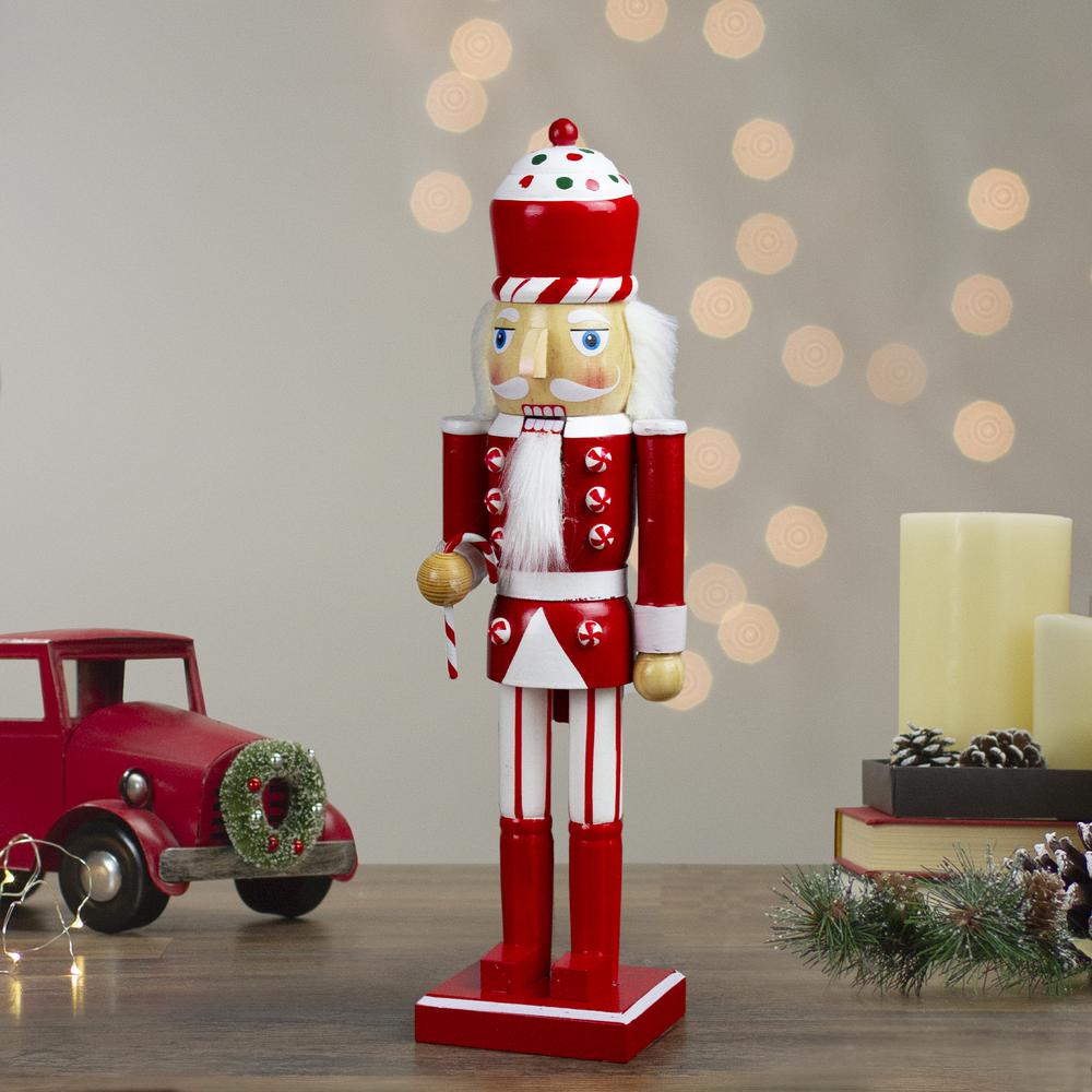 14" Red and White Wooden Candy Cane King Christmas Nutcracker. Picture 2