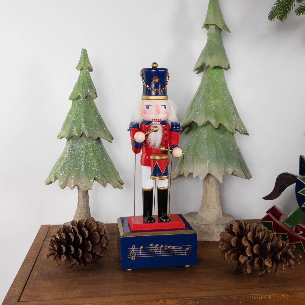 12" Red and Navy Nutcracker Drummer Animated and Musical Christmas Figure. Picture 2