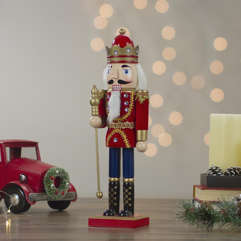14" Red and Gold Traditional Christmas Nutcracker King with Scepter Tabletop Figurine. Picture 2