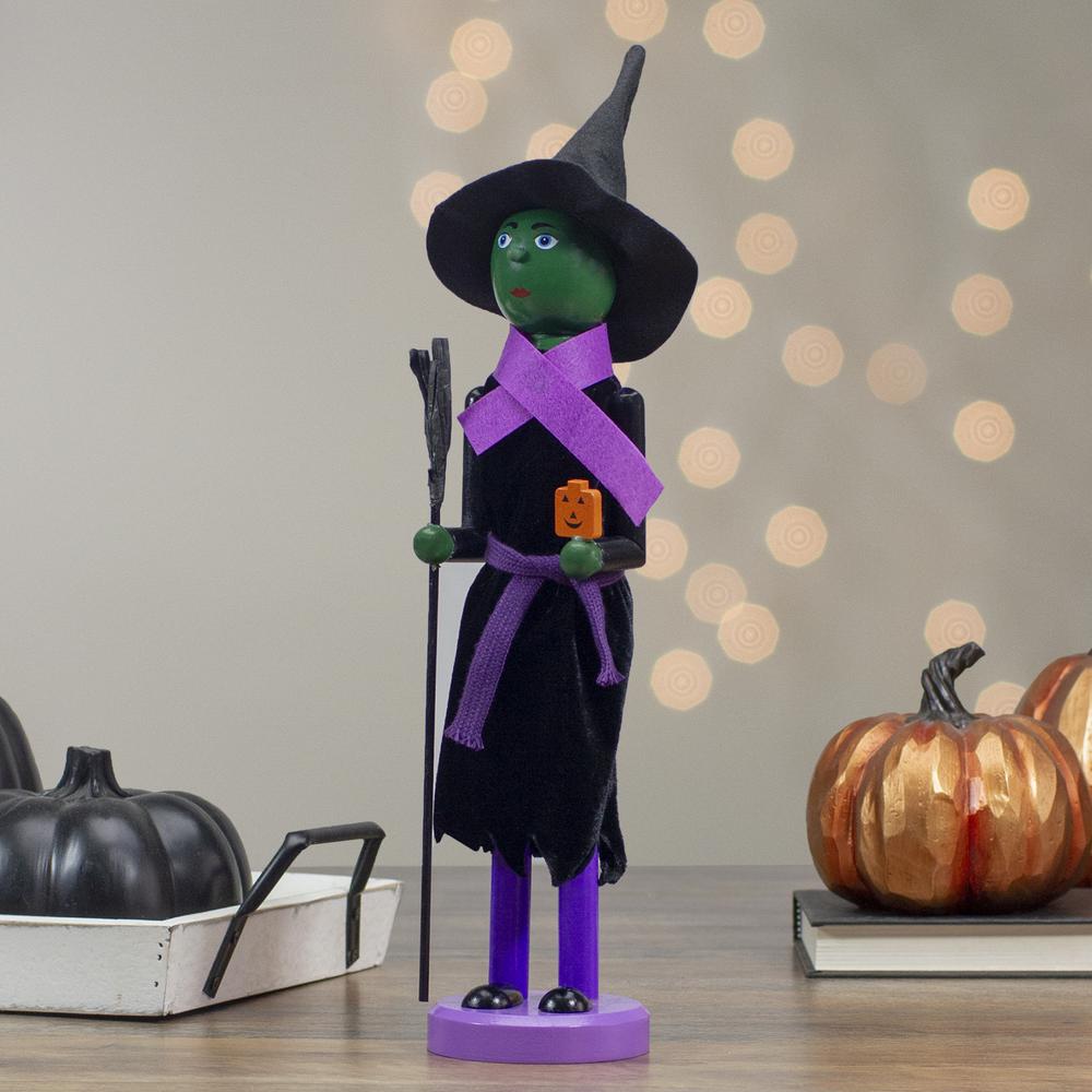 14" Black and Green Witch Jack-O-Lantern Halloween Nutcracker with Broom. Picture 2