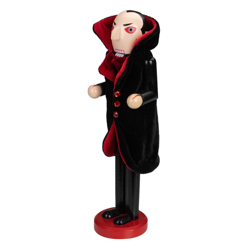 14" Black and Red Wooden Vampire Halloween Nutcracker. Picture 3