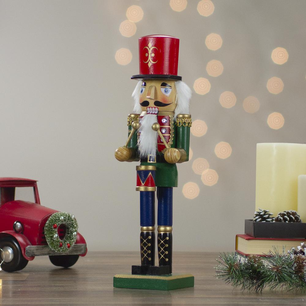 14" Green and Red Traditional Standing Drummer Christmas Nutcracker. Picture 2