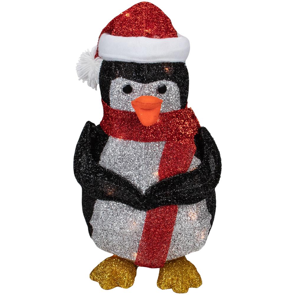 19.5" White and Red Lighted Penguin with Santa Hat Outdoor Christmas Decoration. Picture 1