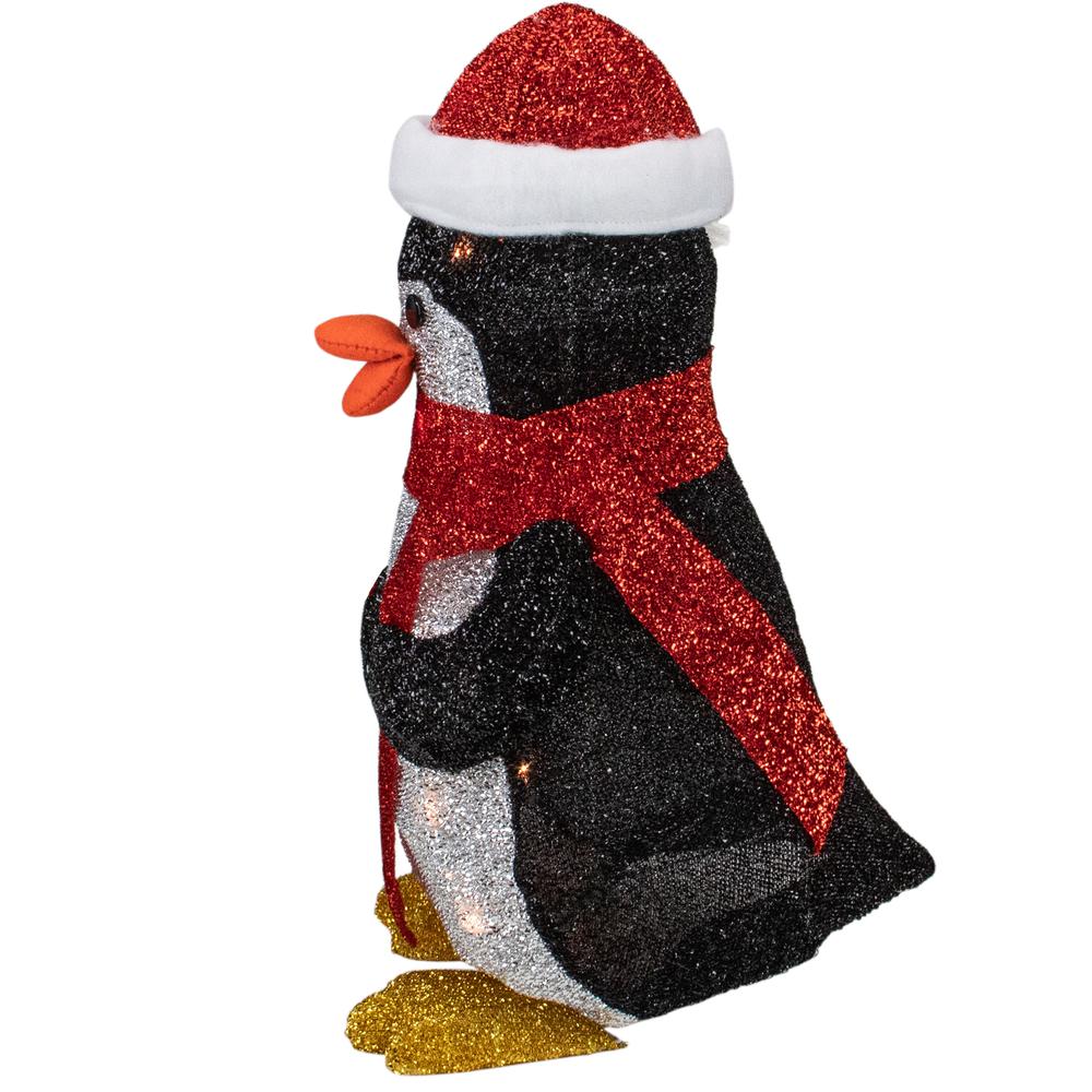 19.5" White and Red Lighted Penguin with Santa Hat Outdoor Christmas Decoration. Picture 4