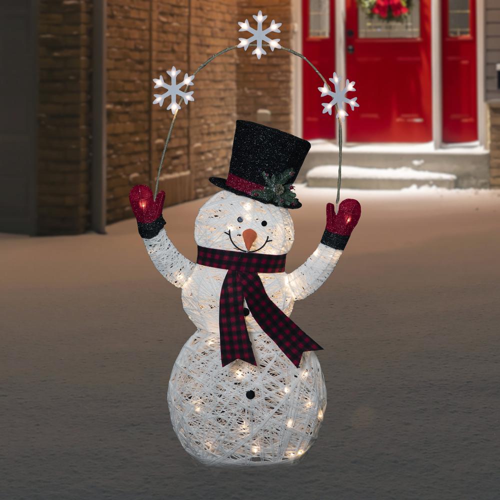 57" LED Lighted Snowman Holding Snowflakes Outdoor Christmas Decoration. Picture 2