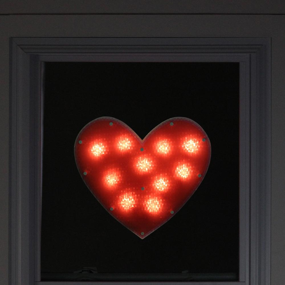 13" Lighted Shimmering Red Heart Valentine's Day Window Silhouette Decoration. Picture 3