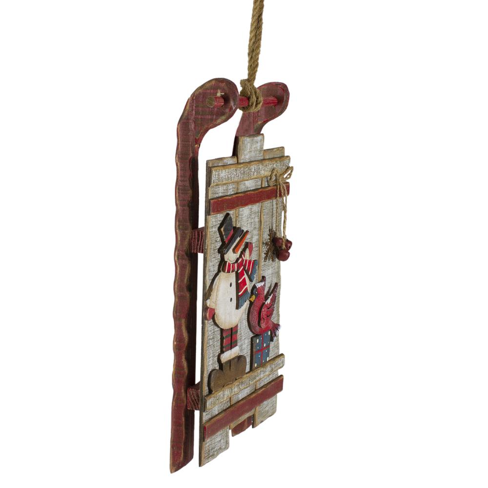 15.25" Brown and Red Wooden Snowman Sleigh Christmas Wall Decor. Picture 2