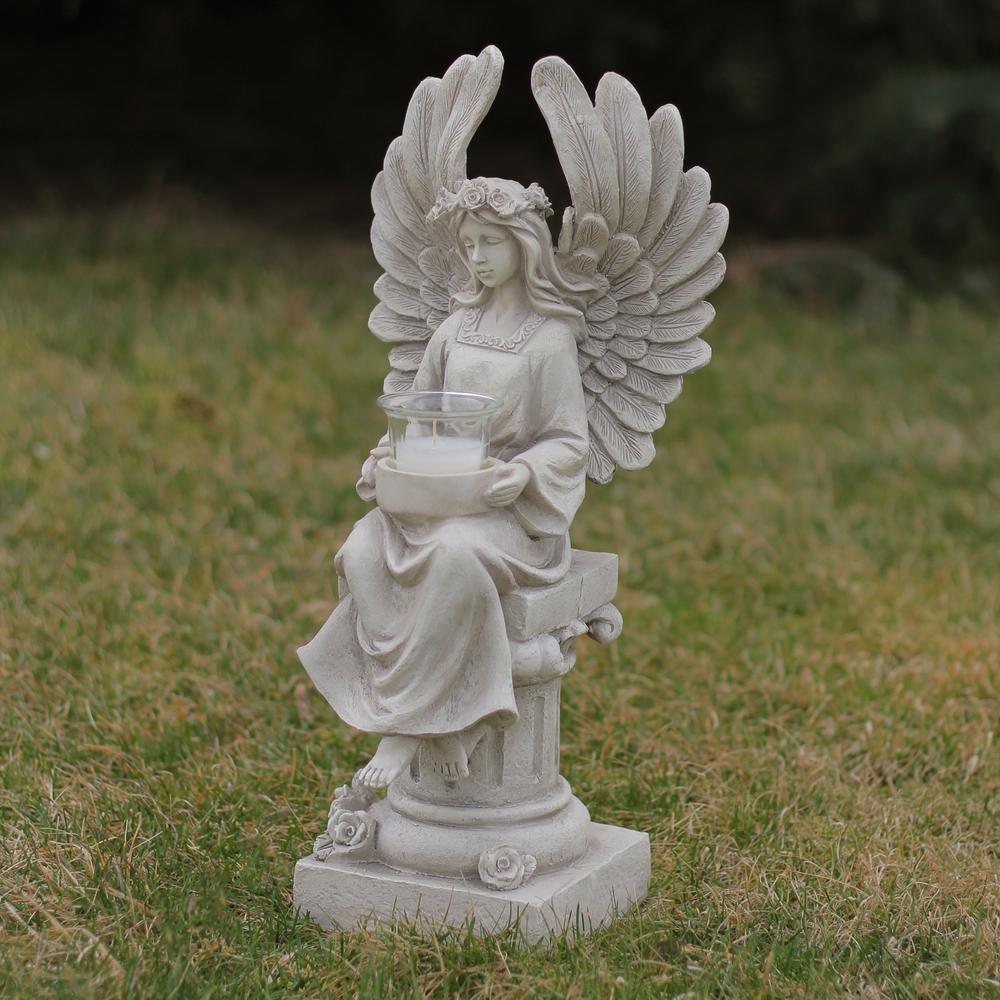 17" Peaceful Angel Sitting on a Pedestal Candle Holder Statue. Picture 3