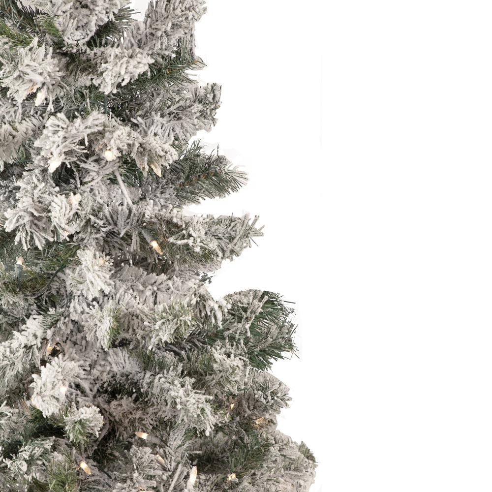 4.5' Pre-Lit Flocked Pine Medium Artificial Christmas Tree - Clear Lights. Picture 2