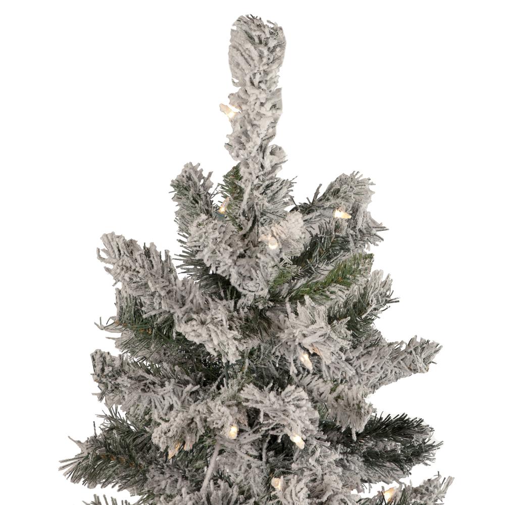 4.5' Pre-Lit Flocked Pine Medium Artificial Christmas Tree - Clear Lights. Picture 3