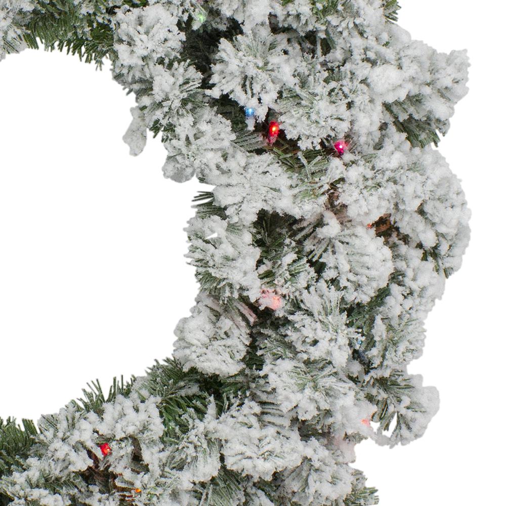 Pre-Lit Heavily Flocked Pine Artificial Christmas Wreath - 24-Inch  Multi-Color Lights. Picture 2
