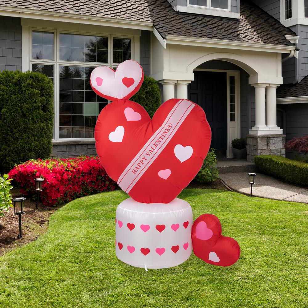 5' Inflatable Lighted Valentine's Day Rotating Heart Outdoor Decoration. Picture 1