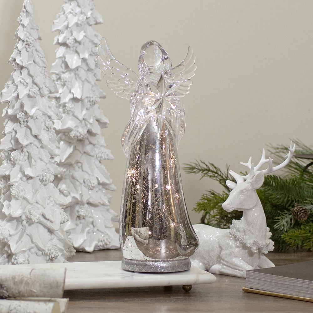 13" Lighted Angel Holding a Star Christmas Tabletop Figurine. Picture 2