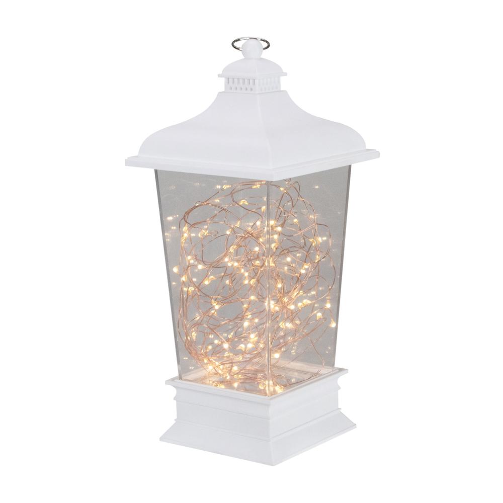 12" Battery Operated White Tapered Lantern with Rice Lights Tabletop Decoration. Picture 1