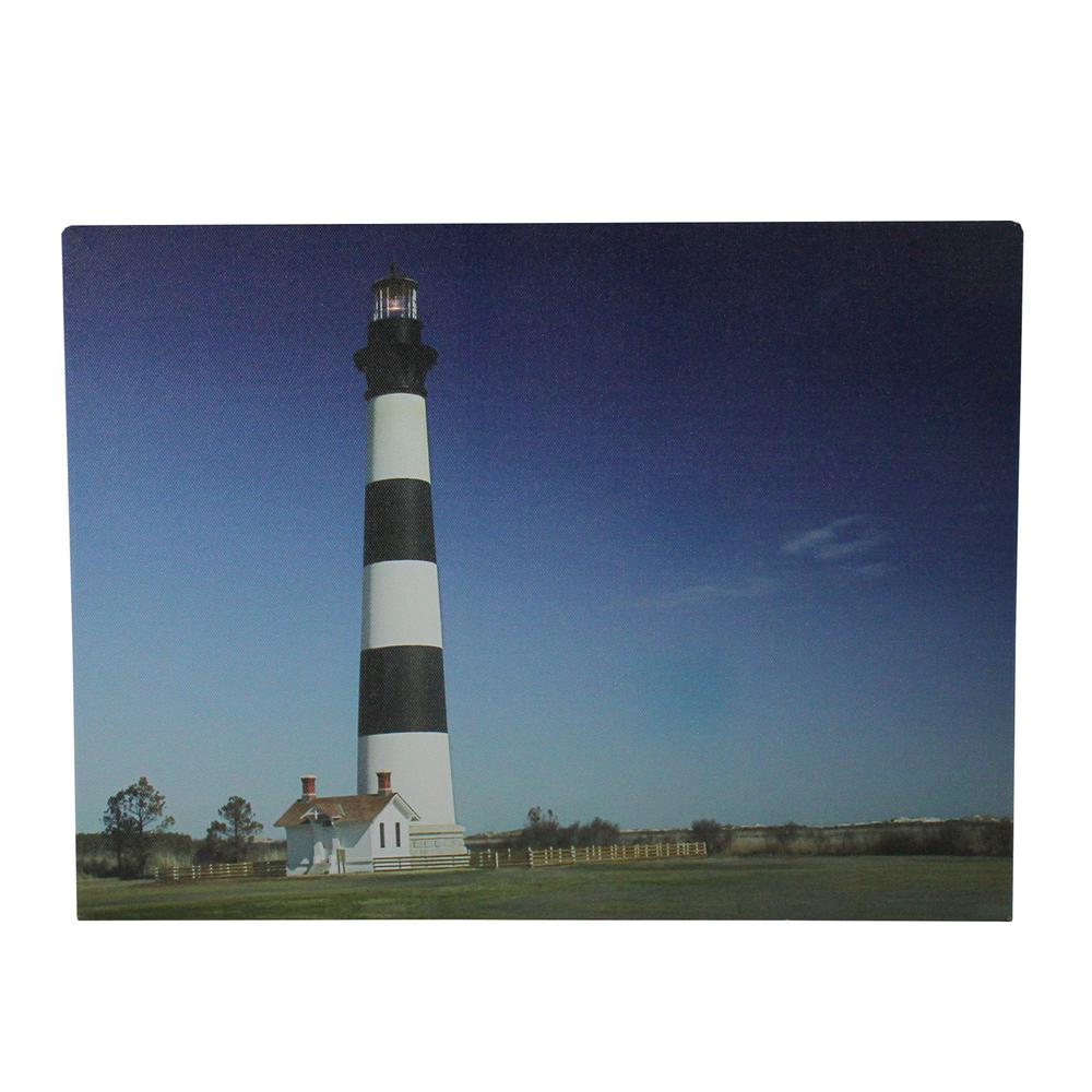 LED Lighted Black and White Striped Lighthouse with Ombre Blue Sky Canvas Wall Art 15.75" x 11.75". Picture 1