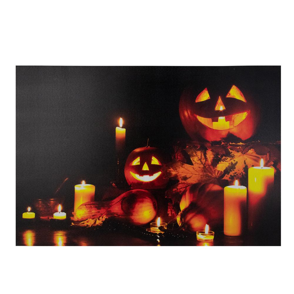 LED Lighted Jack-O-Lanterns and Leaves Halloween Canvas Wall Art 15.75" x 23.5". Picture 1