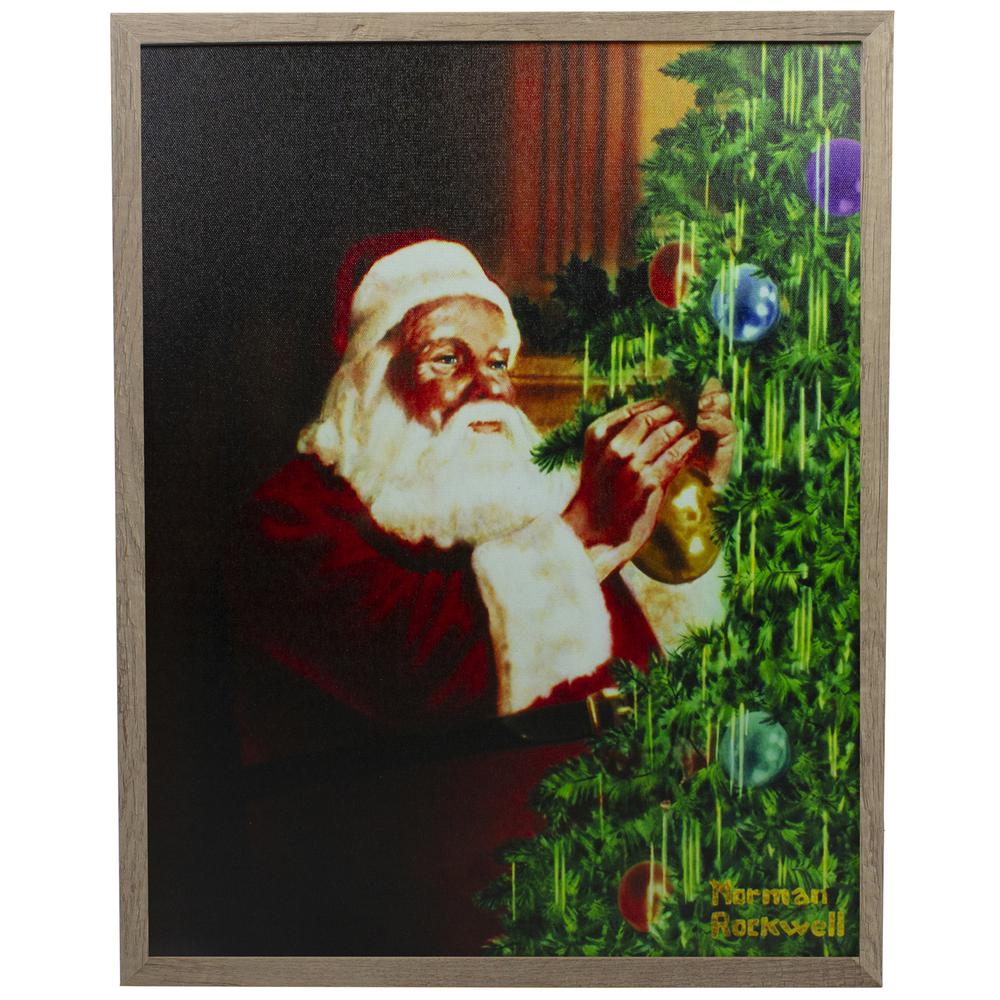 19" Lighted Norman Rockwell 'Santa Trimming Tree' Christmas Wall Art. Picture 1