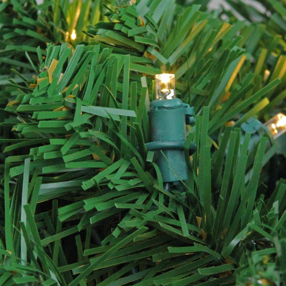 36" Green and Clear Pre-Lit Pine Artificial Christmas Column Swag - Warm White LED Lights. Picture 2
