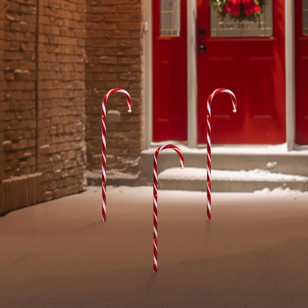 Set of 3 Red and White Blinking Candy Cane Outdoor Christmas Pathway Markers 28". Picture 2