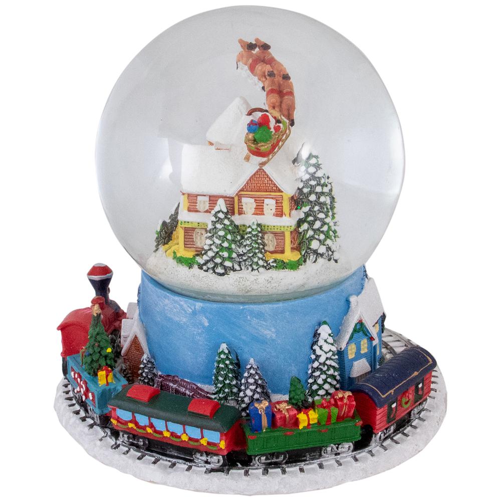 6.5" Revolving House with Santa and Train Musical Christmas Snow Globe. Picture 3