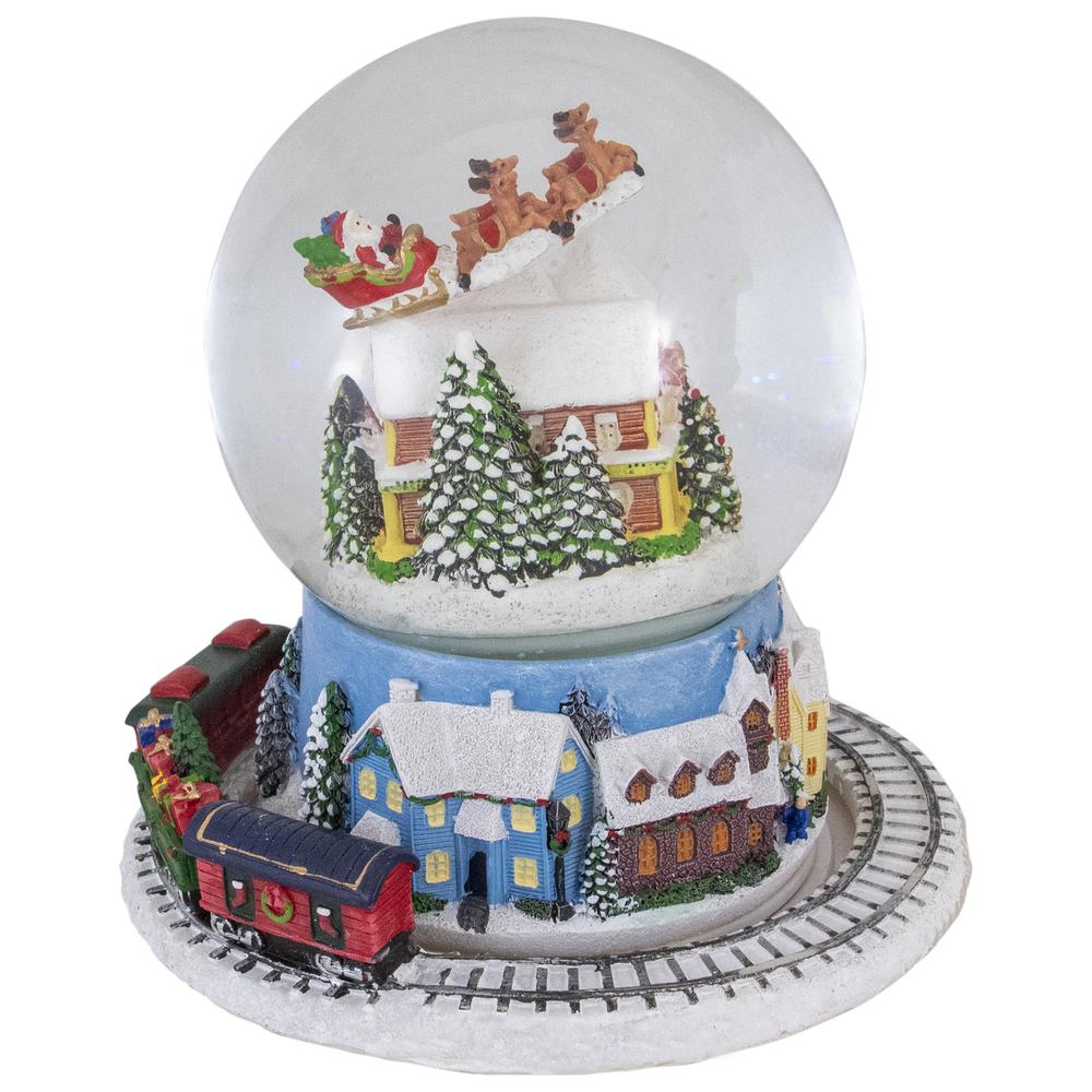 6.5" Revolving House with Santa and Train Musical Christmas Snow Globe. Picture 4