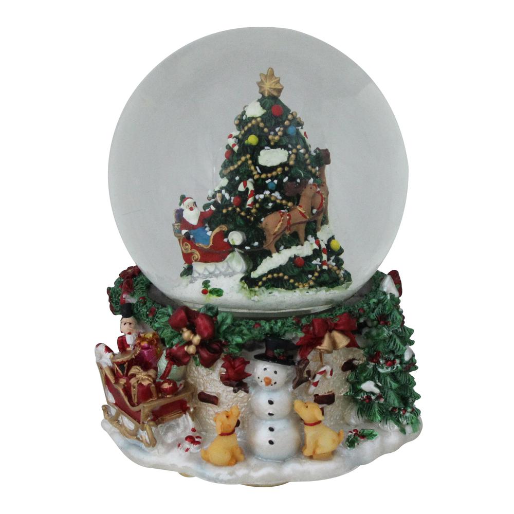 6.75" Christmas Tree and Santa Claus Musical Snow Globe. Picture 1