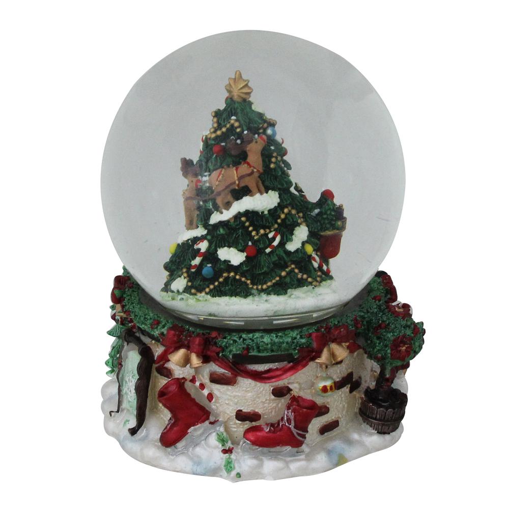 6.75" Christmas Tree and Santa Claus Musical Snow Globe. Picture 2