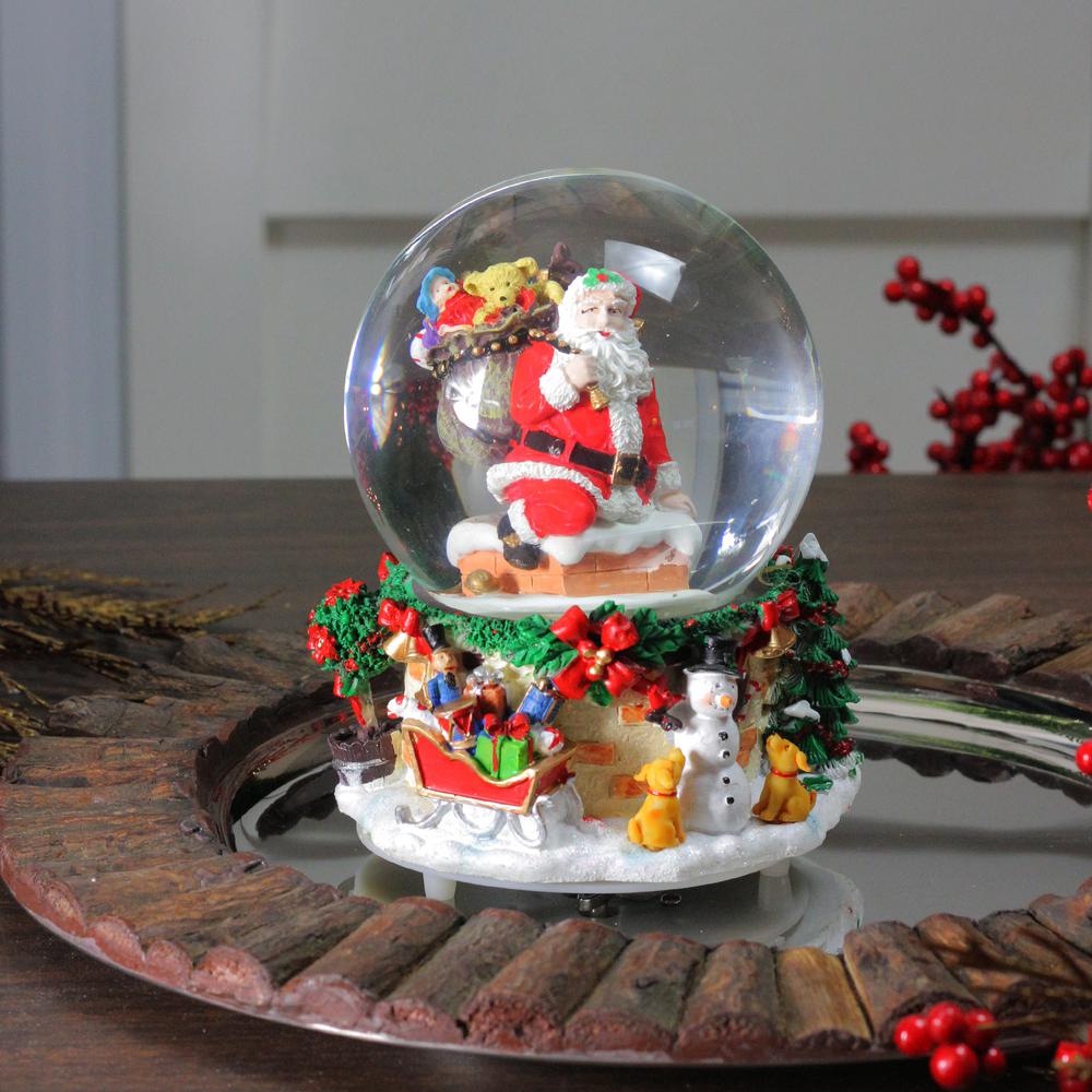 7" Santa Claus in Chimney Musical Christmas Snow Globe. Picture 3