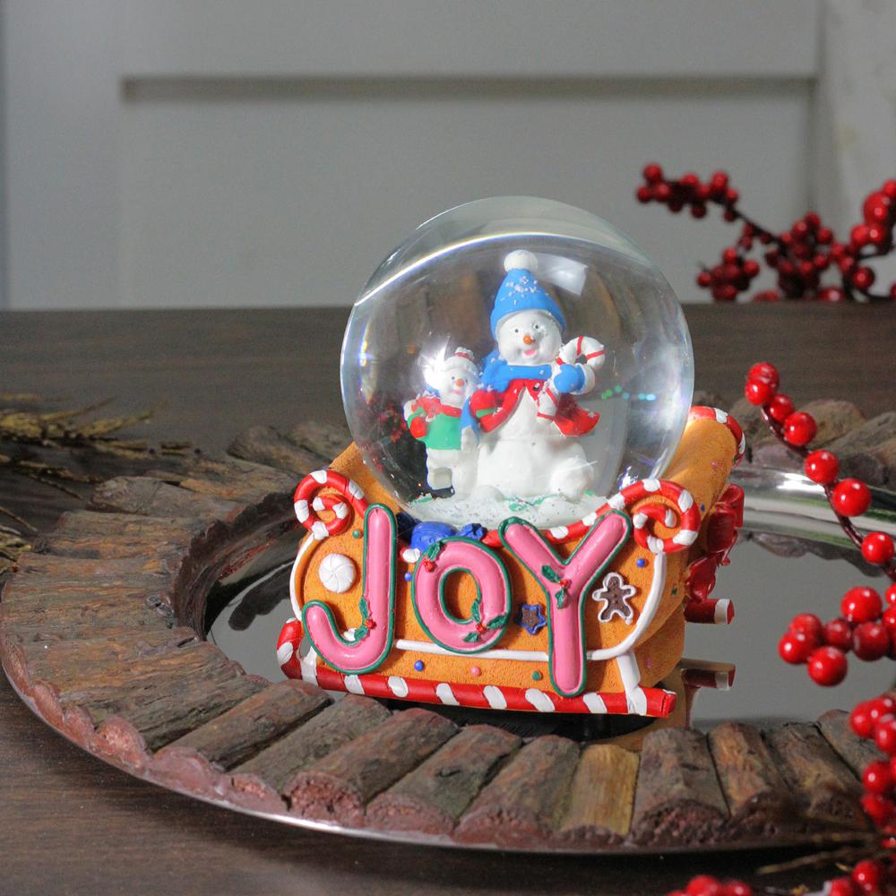 5.25" Musical "Joy" Snowmen and Gingerbread Sleigh Christmas Snow Globe. Picture 3