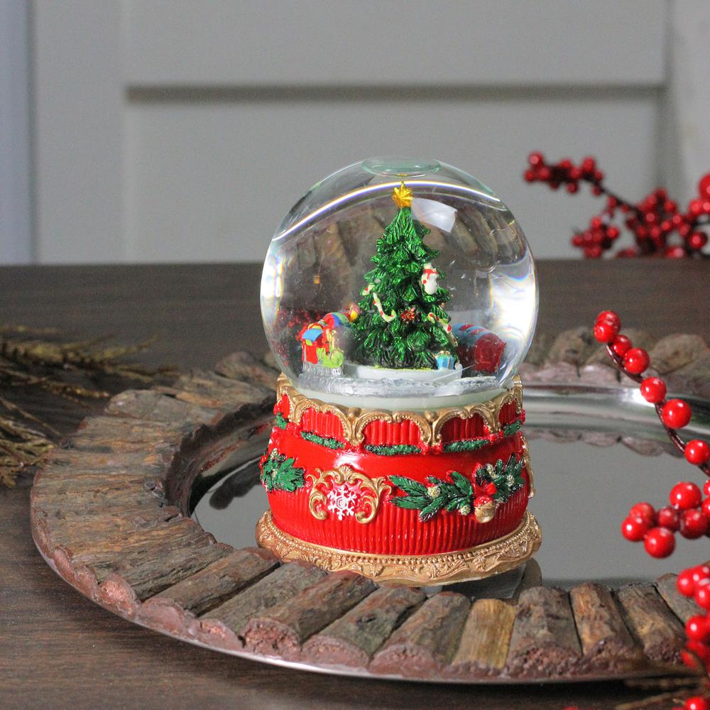 5.5" Christmas Tree and Train Musical Snow Globe. Picture 3