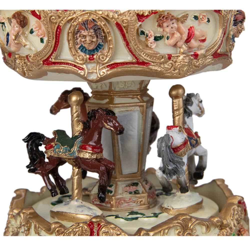 6.5 Ivory and Gold Animated Musical Clown and Cupid Carousel Tabletop Decoration. Picture 2