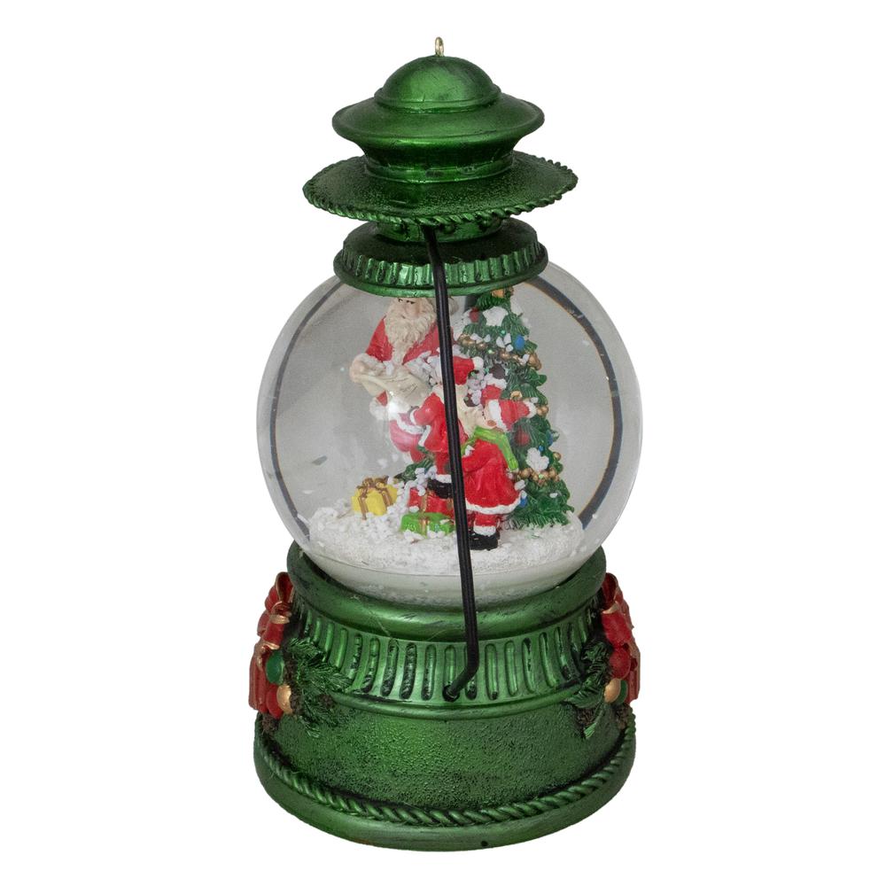 8" Santa Claus and Kids By Christmas Tree Lantern Snow Globe. Picture 4