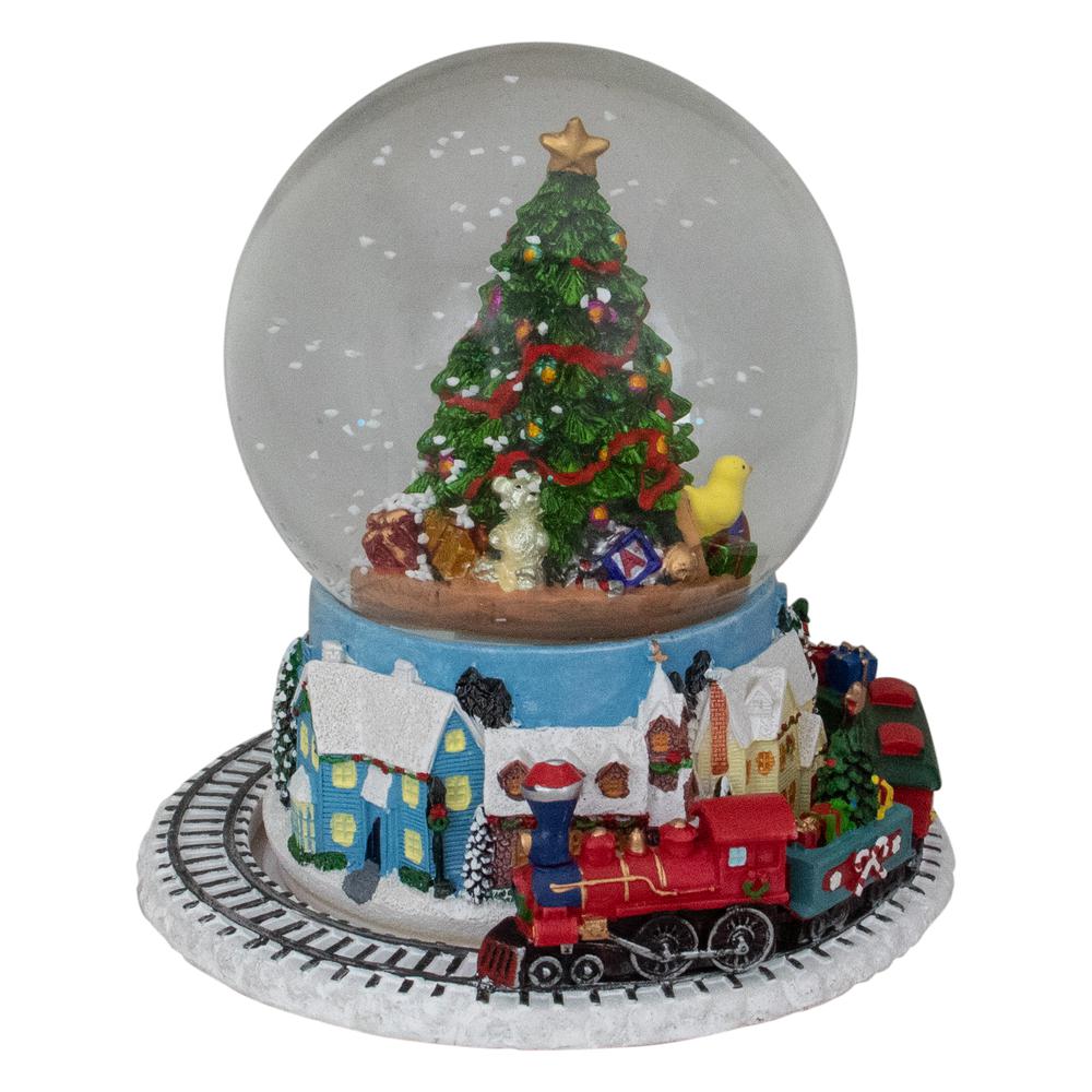 7" Christmas Tree Village Train Musical Snow Globe. Picture 1