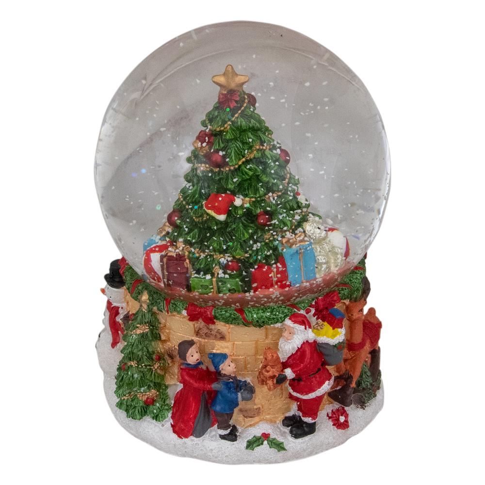 5" Musical Santa Giving Gifts Christmas Tree Snow Globe. Picture 1