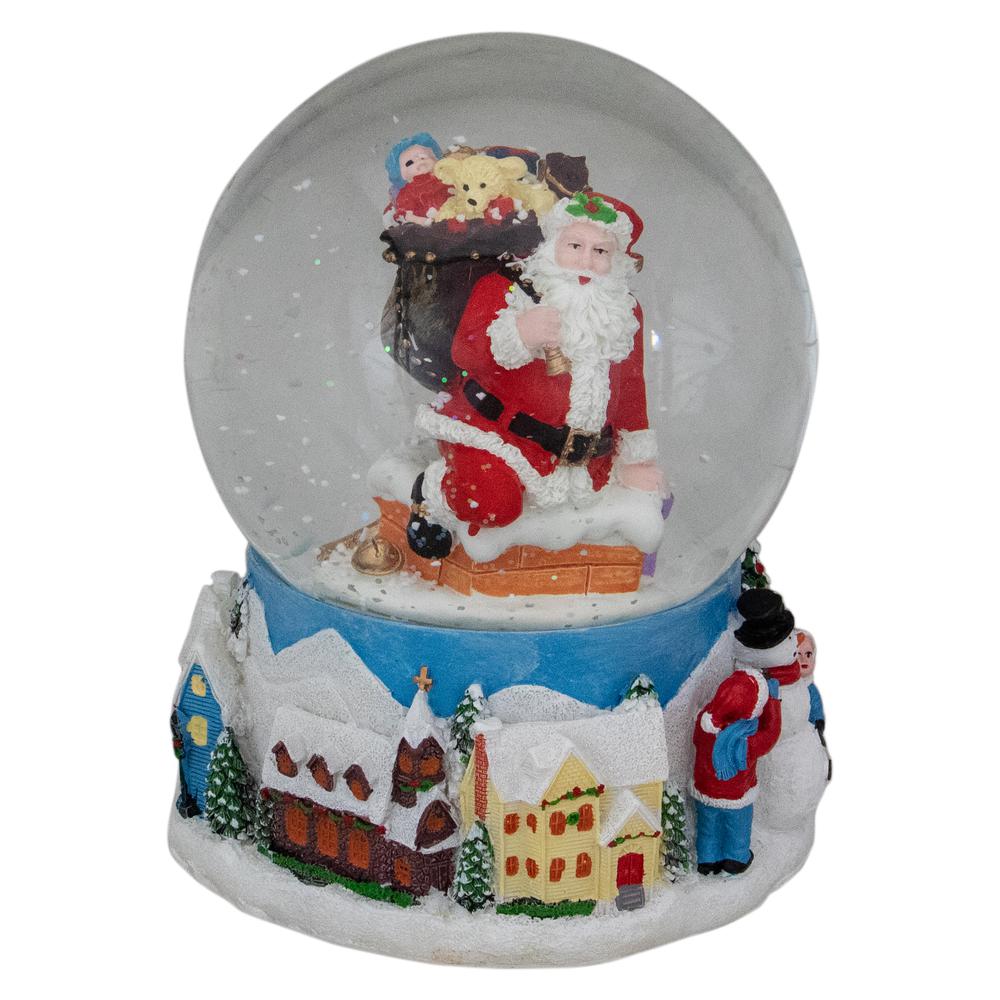 6.5" Santa Coming Down the Chimney Christmas Snow Globe. Picture 1