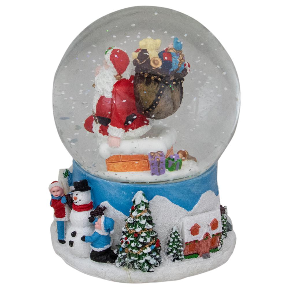 6.5" Santa Coming Down the Chimney Christmas Snow Globe. Picture 2